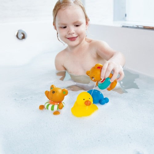 Colorful squirt bath toys featuring teddy bears and marine creatures, encouraging fun and interactive play for babies.