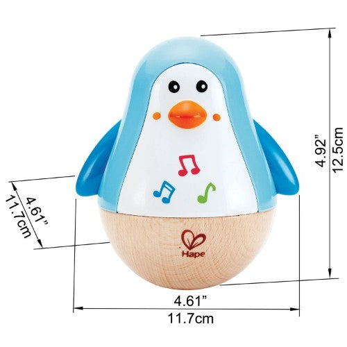 Colorful Hape Penguin Musical Wobbler Toy that wobbles and produces soothing tinkling sounds, promoting motor skills and auditory development.