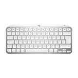 Logitech MX Keys Mini Wireless Keyboard for Mac, compact design, backlit keys, Perfect Stroke technology for efficient typing.