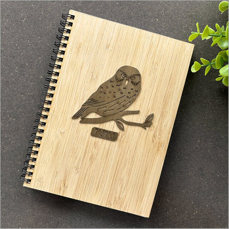 Eco-friendly Bamboo Journal with laser-cut Rimu motif, compact size 160mm x 210mm, 110 pages of high-quality paper.