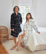 Luxurious navy velour bathrobe with shawl collar, pockets, and waist tie; perfect for couples. Size S/M.