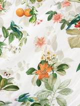 Amalfi Duvet Cover Set in vanilla, featuring vibrant citrus blossoms and leaves on premium cotton for an elegant, luxurious feel.