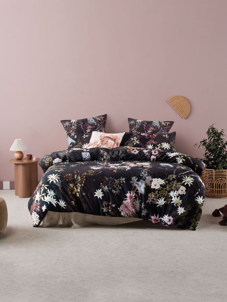 Luxurious king duvet cover set featuring vibrant florals on black cotton sateen for a sophisticated bedroom look.