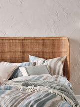 Super King duvet cover set featuring a marble-like design in blues and earthy tones, crafted from soft 100% cotton sateen.