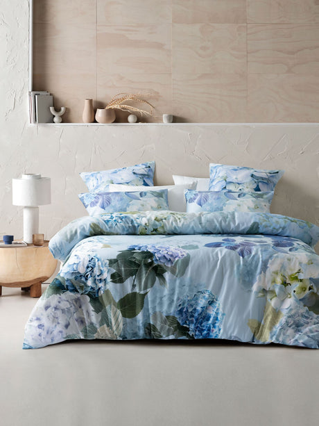 Thea Duvet Cover Set by Savona in sage, featuring floral hydrangea designs on soft cotton sateen for elegant bedroom decor.