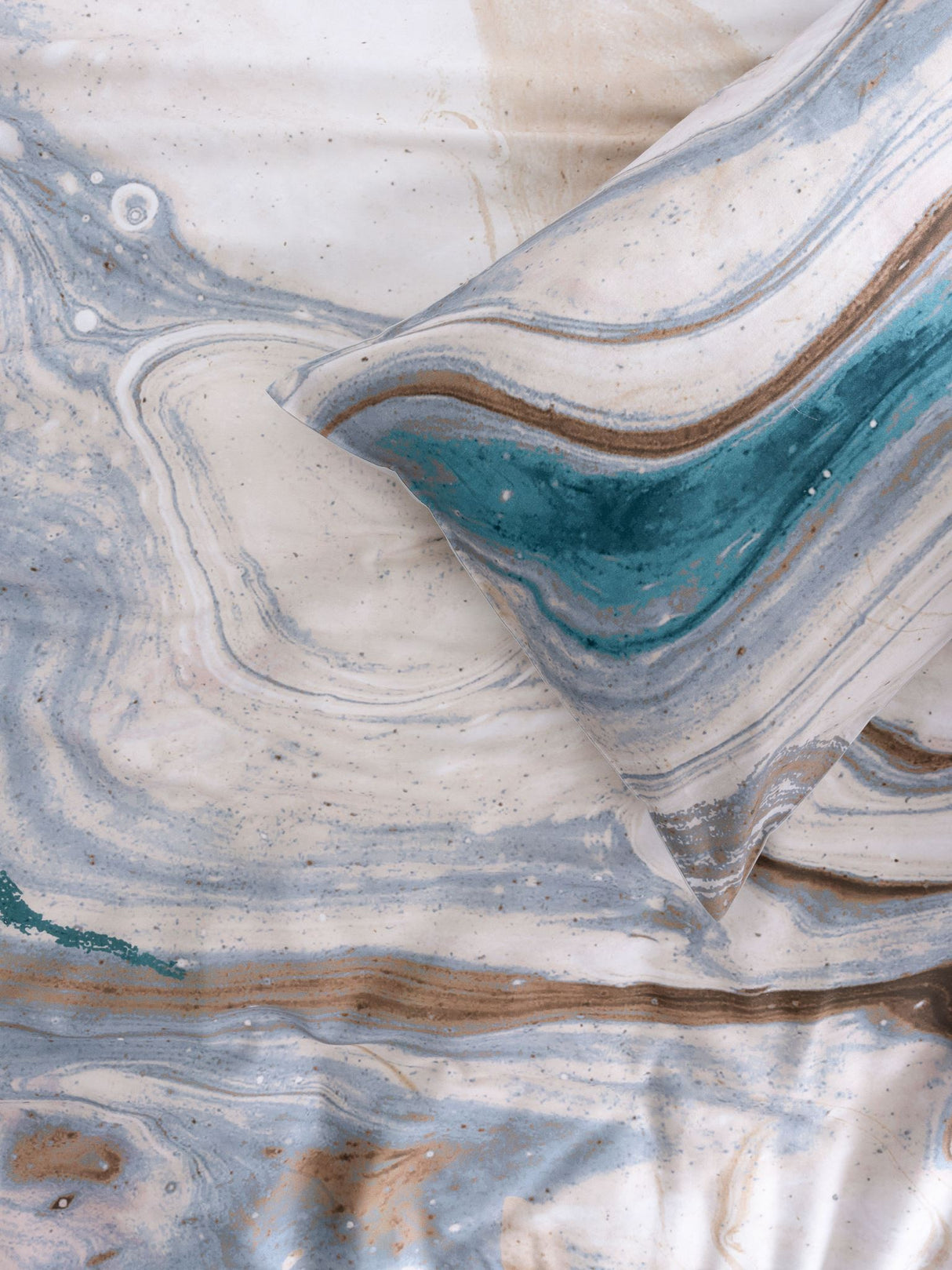Super King duvet cover set in marble-inspired design with rich teal accents, made from 100% cotton sateen.
