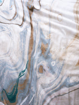 Super King Duvet Cover Set in marble-inspired design, featuring teal accents on luxurious cotton sateen fabric.