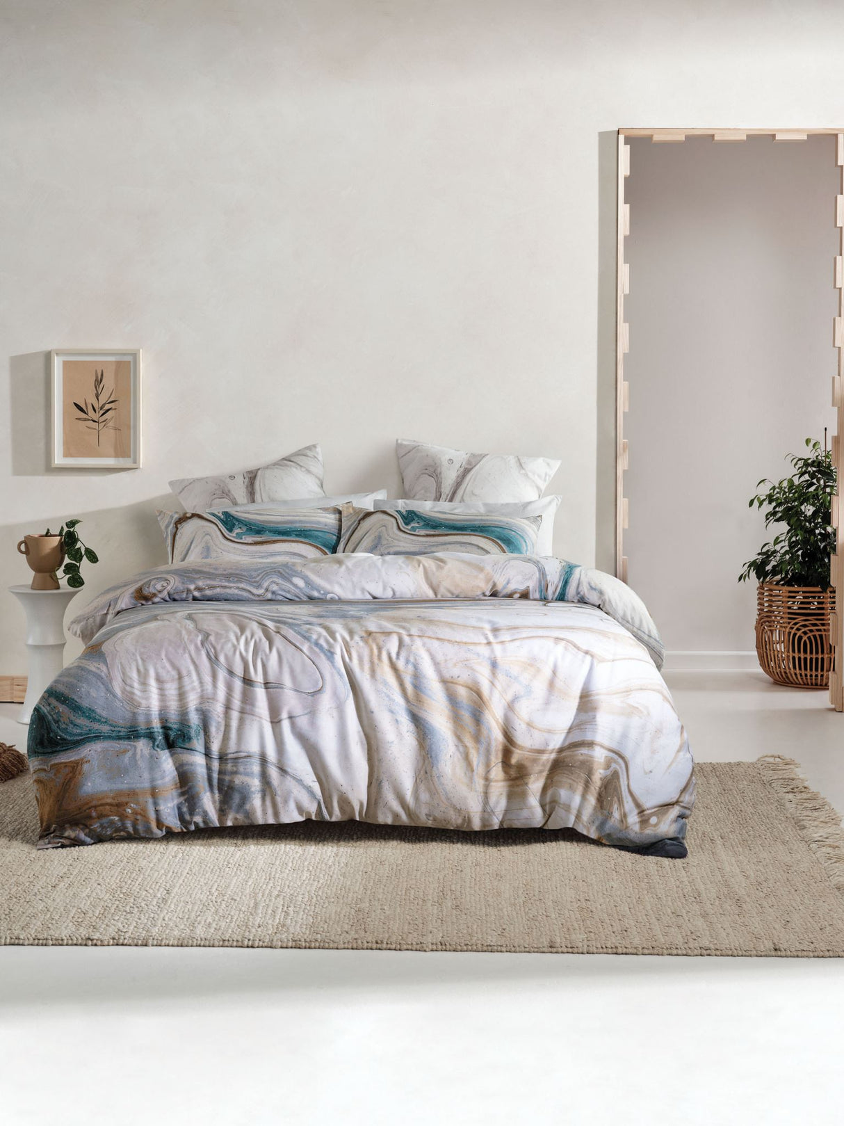 Fluid marble-inspired design super king duvet cover set in earthy tones with teal accents, made of 100% cotton sateen.