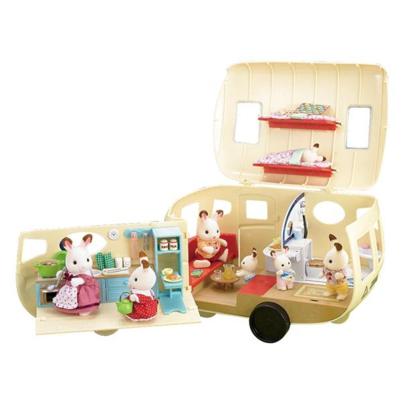 Sylvanian Families Caravan with kitchen, seating that converts to a bed, bunks, shower room, and over 30 accessories for imaginative play.