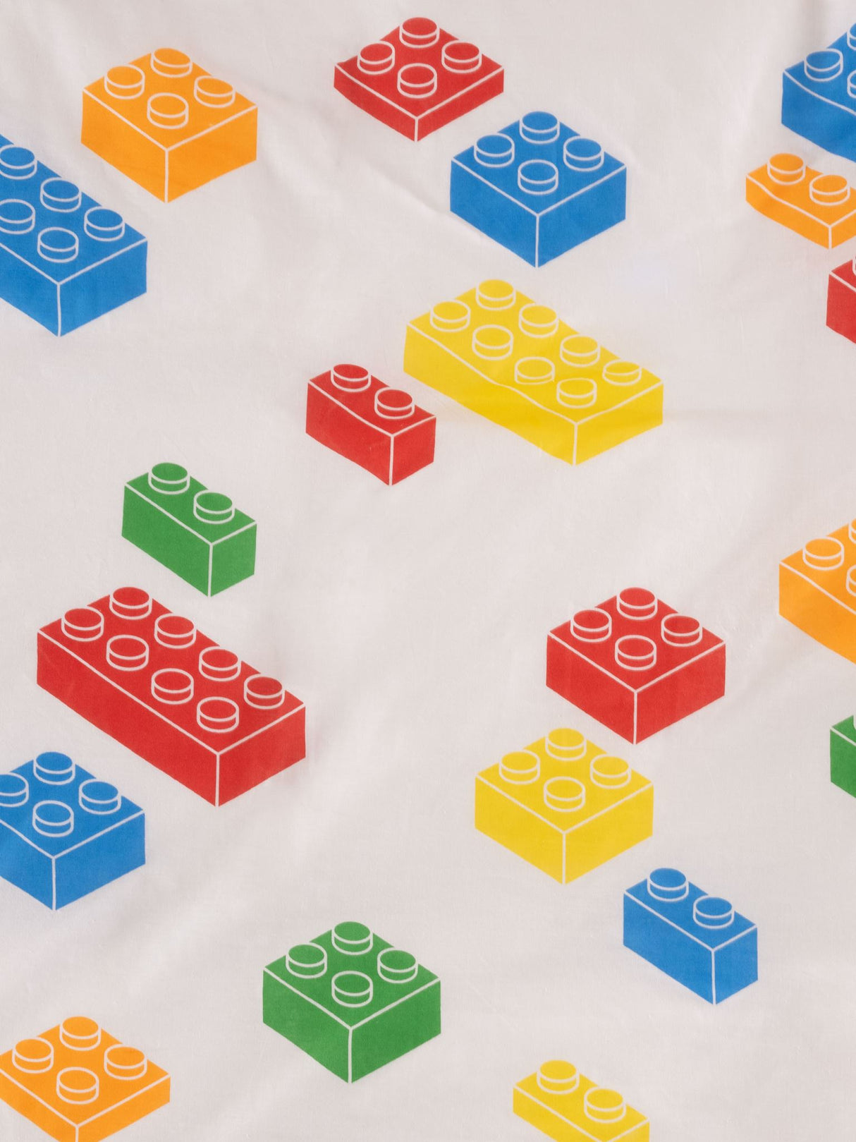 Colorful Block Party duvet cover set by Squiggles features building block designs on a crisp white background, perfect for kids.