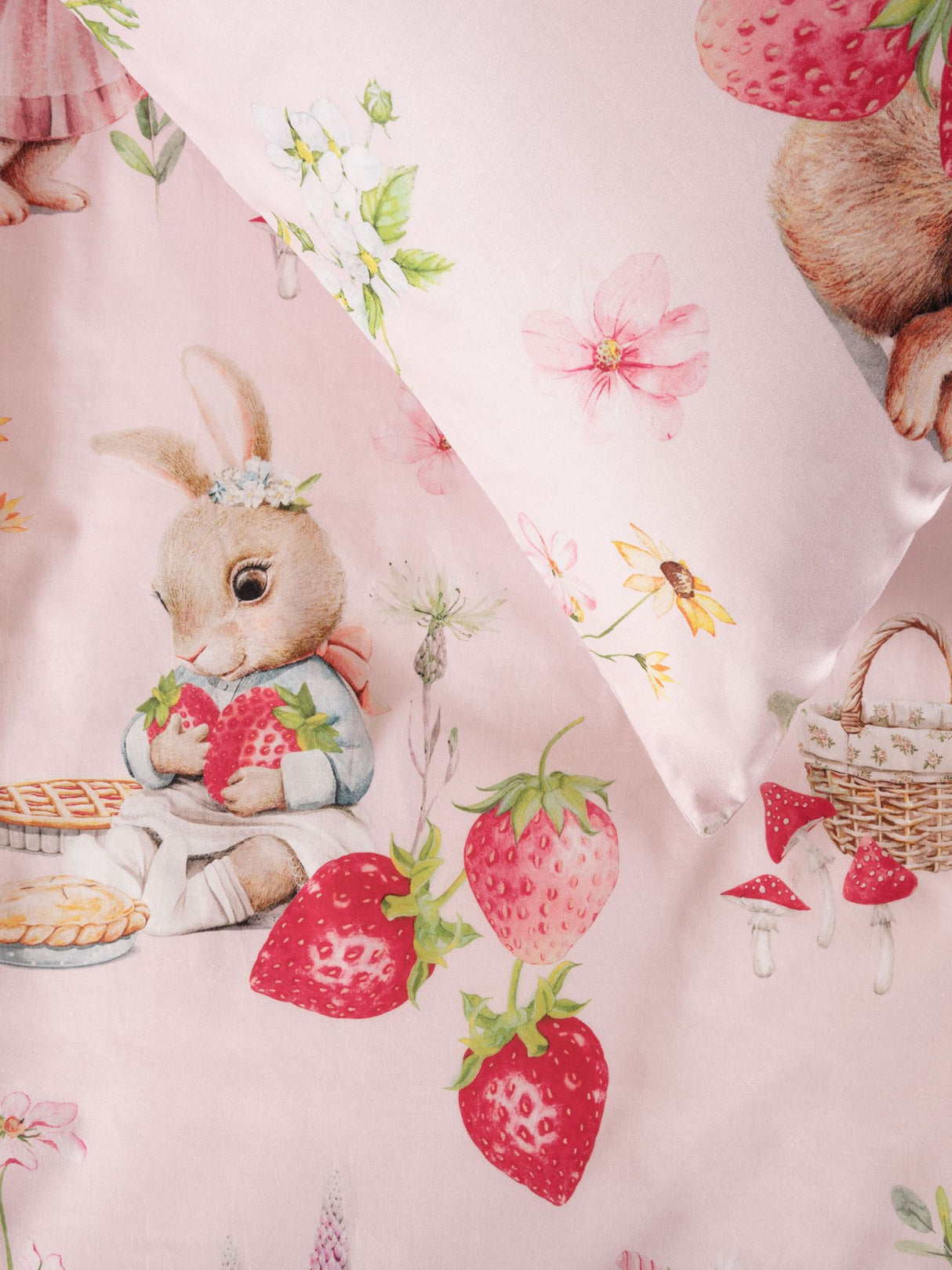 Double duvet cover set featuring bunnies and strawberries on a blush pink background, crafted from 100% premium cotton.