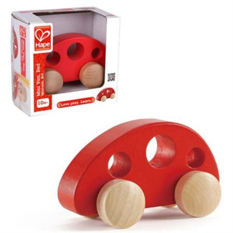 Bright red toy van by Hape, designed for babies, with soft edges and an easy grip for imaginative play and learning colors.