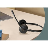 Wireless Jabra Engage 55 UC Stereo Headset in black with noise-cancelling mic and 150m range, ideal for professional communication.