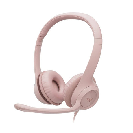 Logitech H390 USB Digital Headset in rose with noise-canceling mic, volume controls, and comfortable ear-cup design.