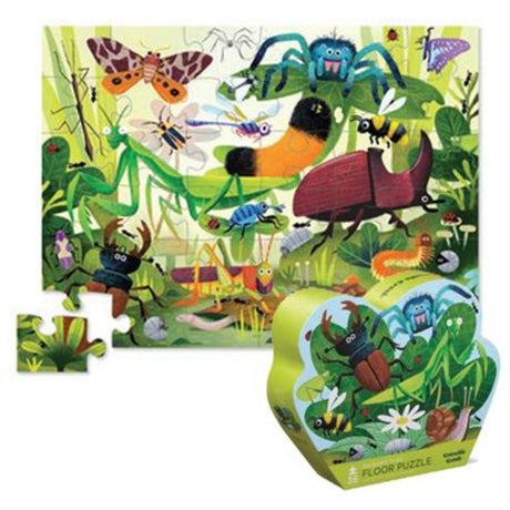 Colorful 36-piece floor puzzle featuring whimsical backyard bug illustrations for kids aged 3 and up.