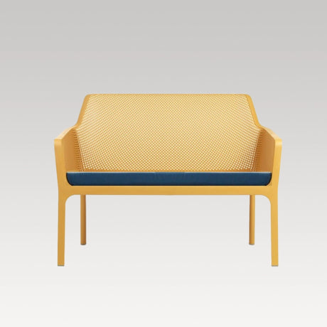 Mustard double Net Bench with cushion featuring stylish curves, diamond perforation, and eco-friendly materials for outdoor seating.