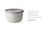 Mepal Cirqula Round 1000ml bowl in Nordic White, versatile for storage, microwave, and serving, with airtight lid and transparent window.