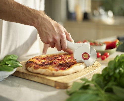 Ringo Pizza Wheel by Joseph Joseph with sharp stainless-steel blade and ergonomic design for effortless slicing and easy cleaning.