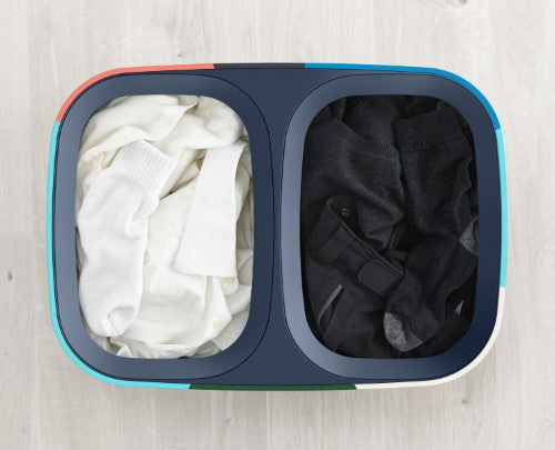 Stylish 90L dual-compartment laundry basket with removable tote bags for easy fabric separation and transport.