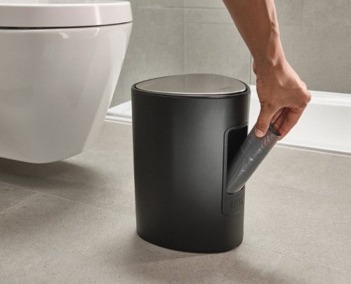 Sleek 5L matte black pedal bin by Joseph Joseph with soft-close lid, removable bucket, and rear liner pocket.