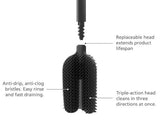 Innovative black toilet brush with flexible triple-action head, anti-drip design, and stylish storage holder for hygienic cleaning.