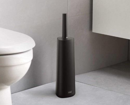 Flexible black toilet brush with triple-action head, anti-drip design, and sleek storage holder for hygienic bathroom cleaning.