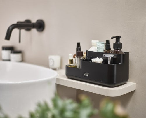 Stylish black Easystore Bathroom Caddy with divided compartments for organized storage of grooming essentials. Non-slip base included.