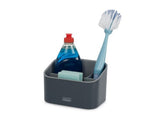 Stylish tiered sink tidy by Joseph Joseph, featuring three compartments for organized washing-up essentials.