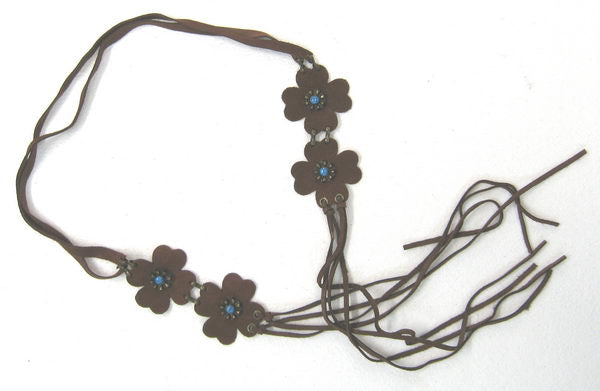 Brown suede belt with floral design, perfect for elevating any outfit with elegance and versatility.
