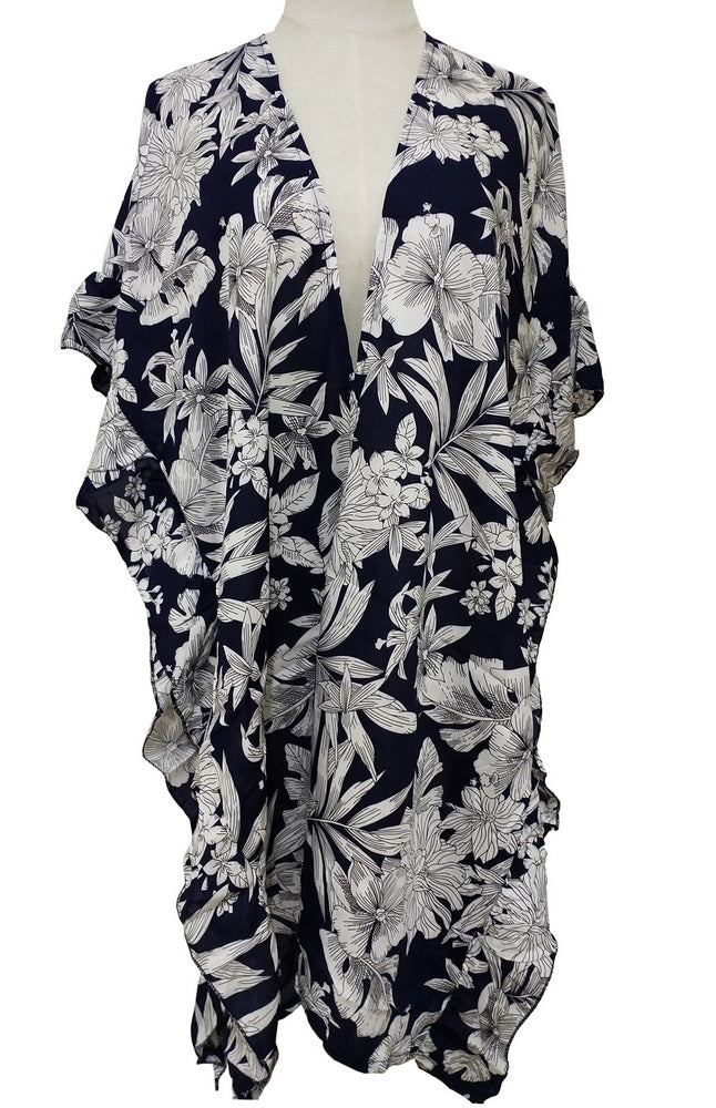 Elegant black side ruffle cape made of 100% viscose, perfect for layering and enhancing any outfit.