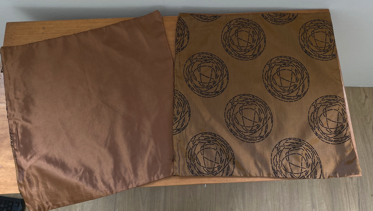 Set of 6 brown circular pattern cushion covers, combining style and durability for versatile home decor.