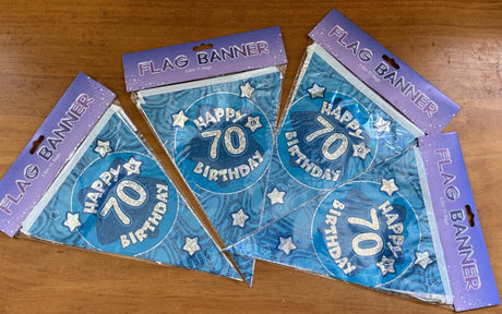 Vibrant blue "Happy 70th Birthday" banners, perfect for celebrating a milestone birthday in style and cheer.