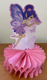 Whimsical fairy princess honeycomb centrepiece in pastel colors for magical parties and celebrations.
