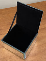 Square trinket box with a wedding bells design, perfect for storing keepsakes and enhancing home decor.