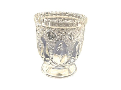 Eight-centimeter glass candle holders from MAX Brand, perfect for enhancing home ambiance with elegant flickering light.