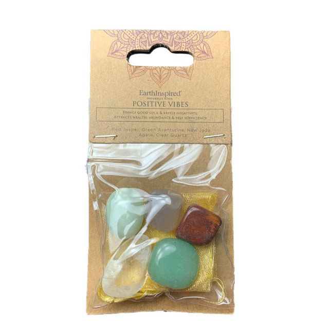 Set of 3 crystals including Red Jasper, Green Aventurine, and Clear Quartz in an organza bag for positive energy and abundance.
