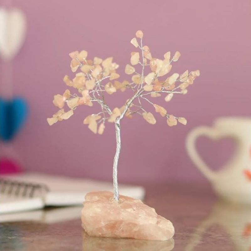 Handcrafted 19cm Rose Quartz Crystal Tree with 100 chip gemstones, promoting love and harmony in any space.