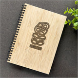 Bamboo journal with laser-cut Riverwood Rimu motif, 110 pages of eco-friendly cartridge paper, perfect for travel or art.