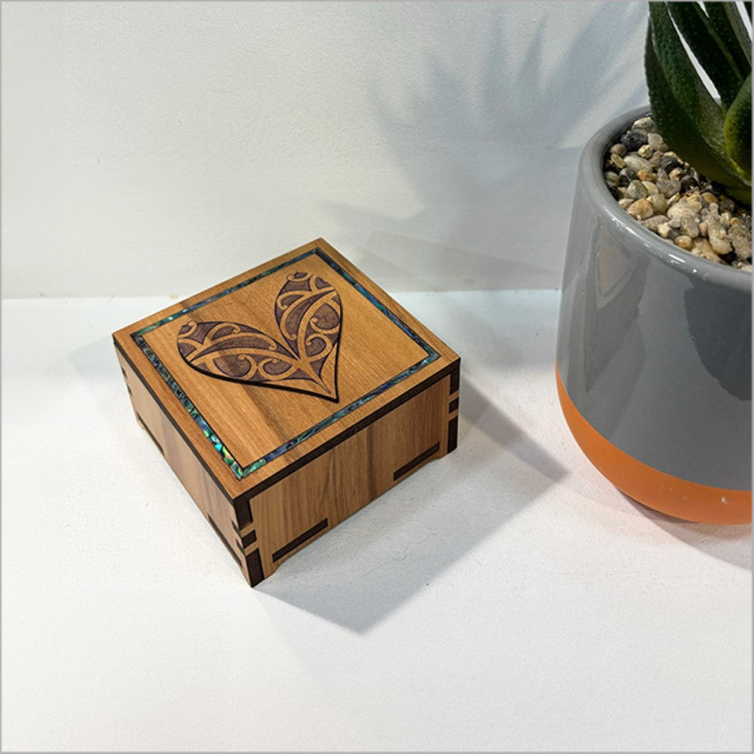 Heart-shaped small trinket box with Paua inlay, crafted from NZ veneer, perfect for jewelry and keepsakes.