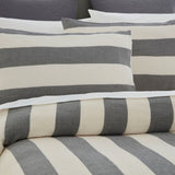 Duvet cover set with white and grey vertical stripes, includes king duvet and two matching pillowcases, made from soft OEKO-TEX cotton.