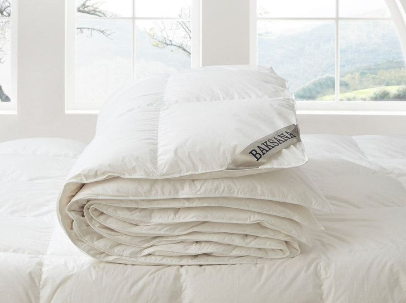 King-sized duvet inner filled with 80% Hungarian goose down, encased in OEKO-TEX certified cotton for warmth and breathability.