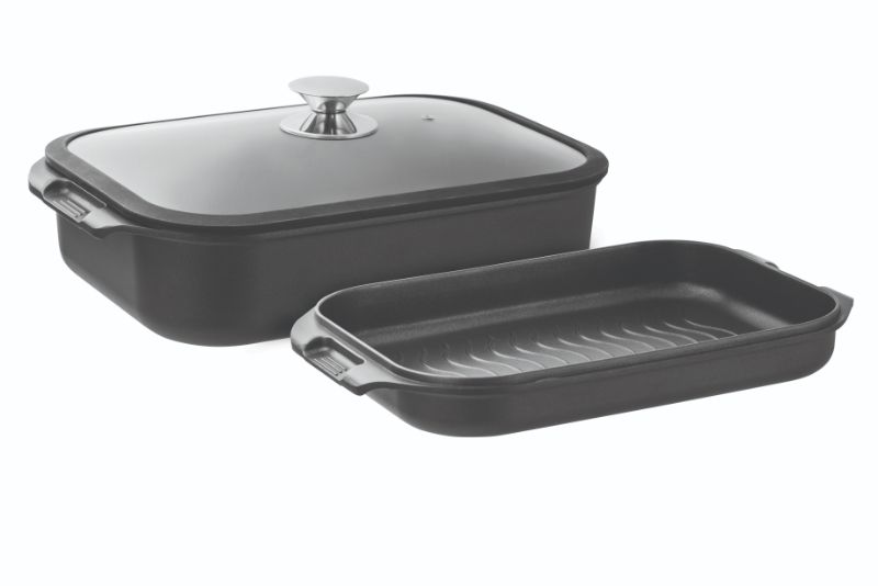 Versatile Double Roast/Grill Set with two induction-compatible roasters and glass lid for even cooking and convenient storage.