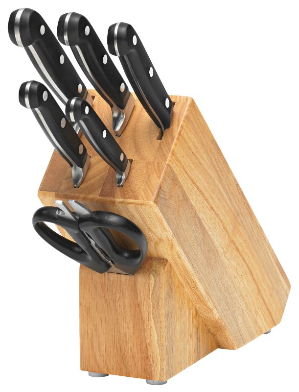 7-piece Mundial cutlery set in a timber block, featuring high-carbon stainless steel knives for precision cooking.