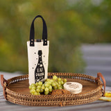 Elegant natural and black cotton wine carrier with sturdy handle, perfect for stylishly transporting wine bottles.