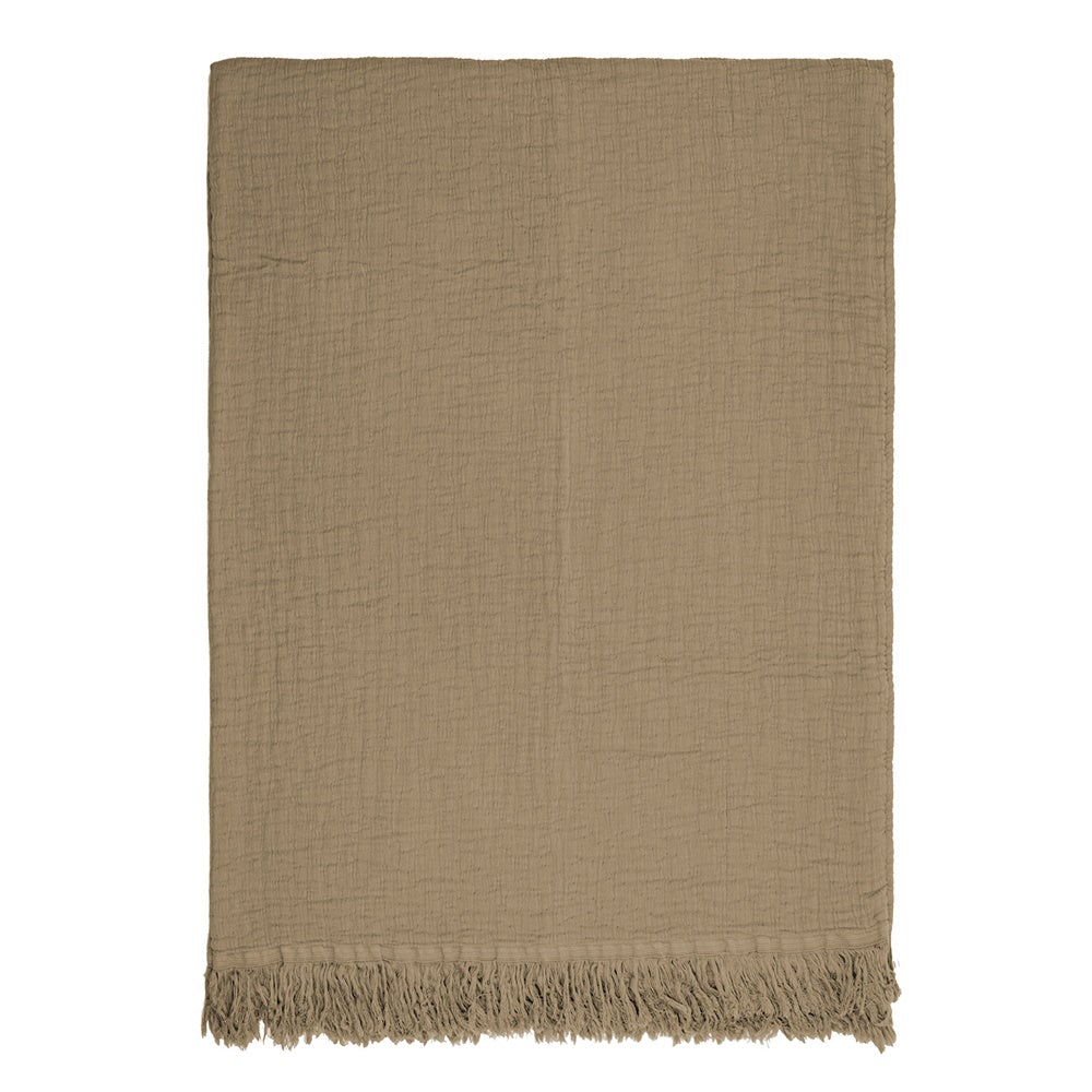 Luxurious stonewashed cotton throw in donkey hue, 140x160cm, featuring fringed edges for elegance and comfort.