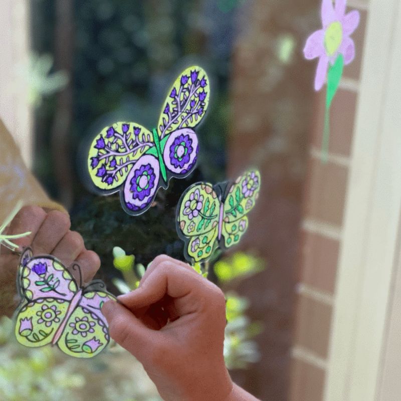 Colorful, reusable butterfly window stickers from Tiger Tribe, designed for creative decoration and easy repositioning.