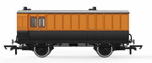Hornby LSWR 4WC Passenger Brake 82 model with oil lamps and step boards, enhancing railway layouts and capturing Southern Railway history.