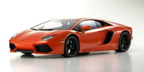 Diecast model of a vibrant orange Lamborghini Aventador, showcasing exquisite detailing and realistic features.