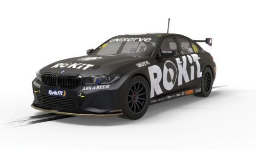 Slot car model of BMW 330i BTCC '22 driven by Jake Hill, featuring detailed design and dynamic racing performance.