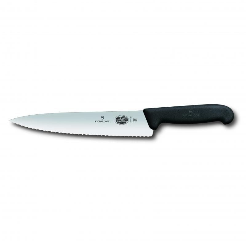 Victorinox 25cm wavy edge carving knife with Fibrox handle, ideal for precise slicing of meats and vegetables.